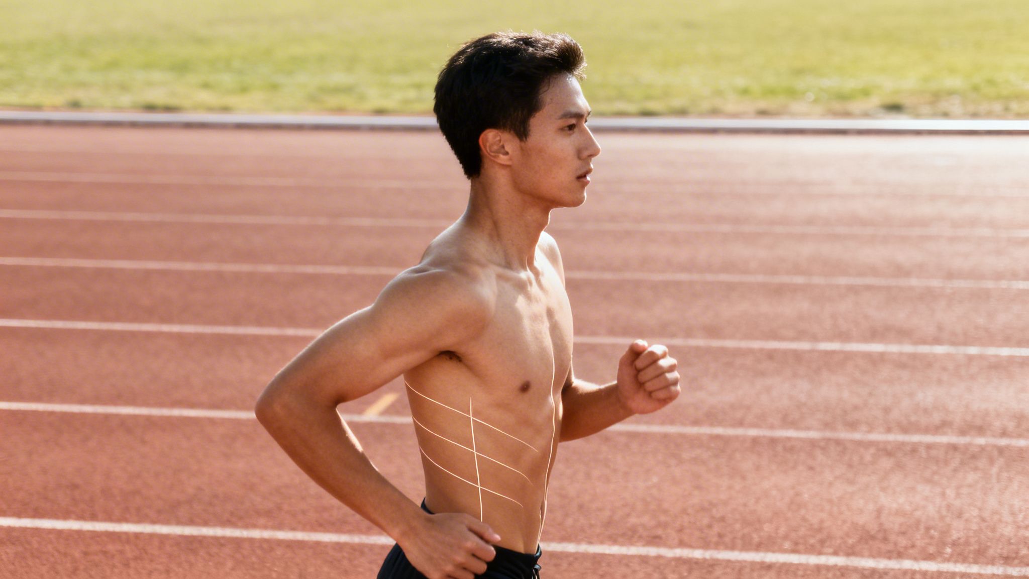 A shirtless man runs on a track with lines drawn on his side, illustrating a side stitch.